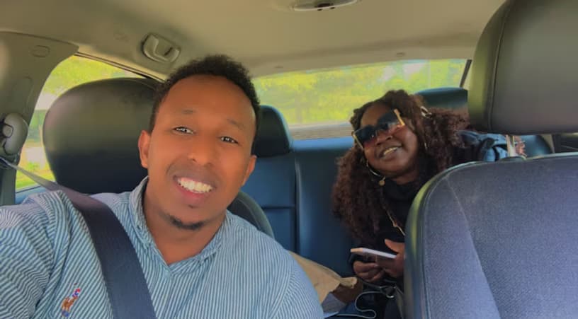 Professional driver assisting client - FastTrack Transportation